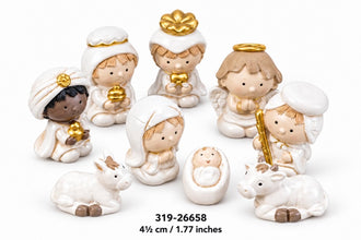9-piece miniature Christmas Nativity scene with Holy Family, Magi, angel and animals against white background