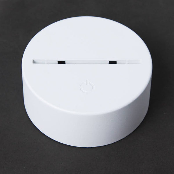 White 3D LED night light base with power button