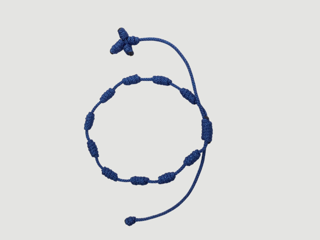 Dark Blue adjustable knotted decade cord bracelet with woven cross