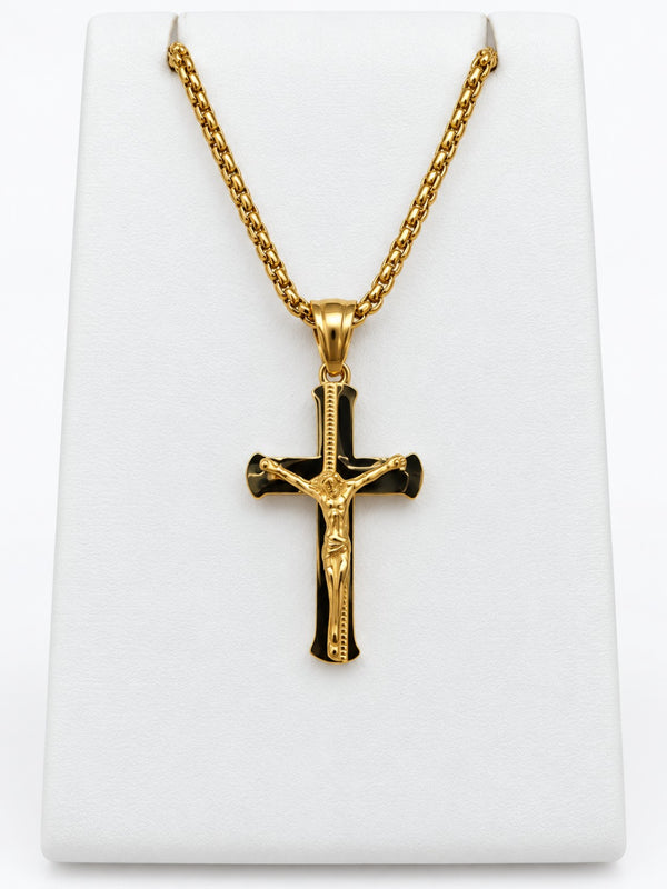 A polished gold-tone crucifix with flared cross ends and a raised figure of Jesus.