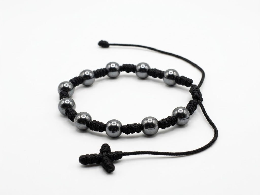 Adjustable hematite bead decade rosary bracelet in black knotted cord with woven cross