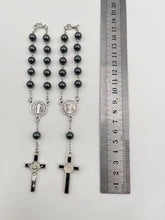 Hematite Saint Benedict auto rosary size shown with ruler