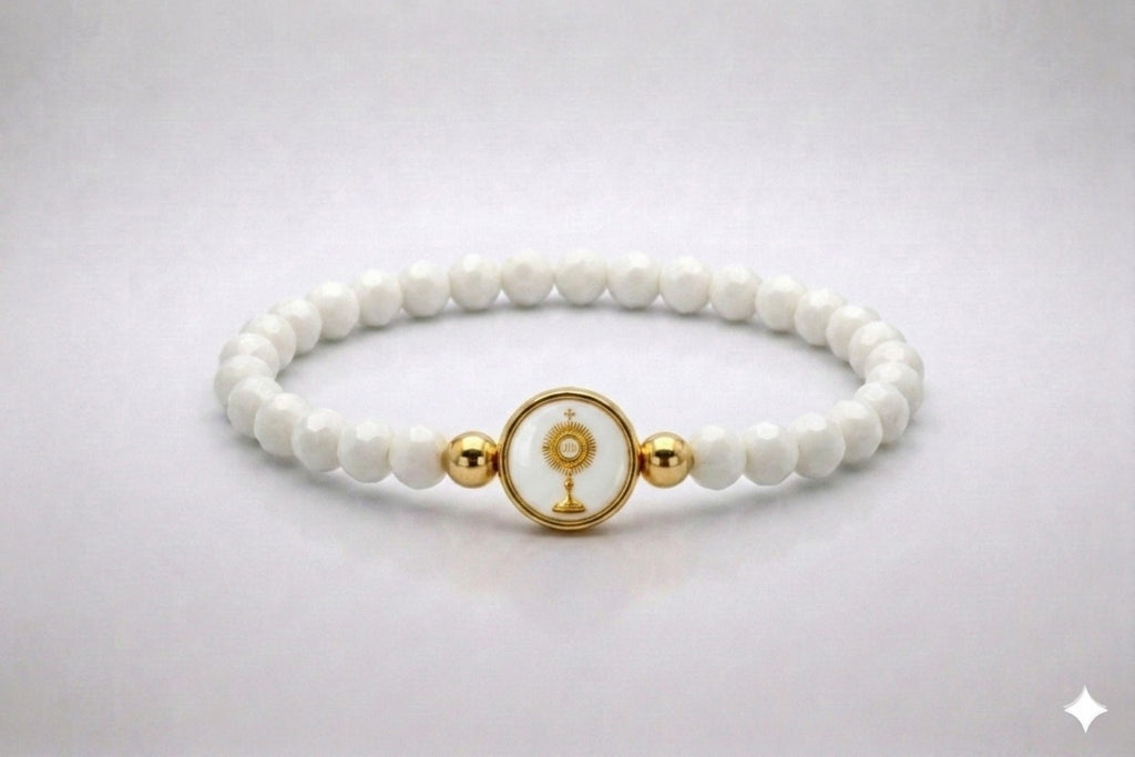 Holy Eucharist white crystal elastic bracelet with gold-tone centerpiece, front view