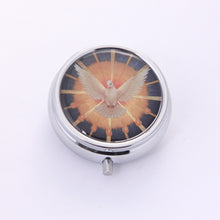 Holy Spirit dove image on round silver-tone metal keepsake box