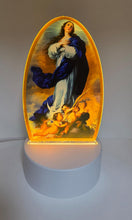Immaculate Conception LED night light illuminated in warm light