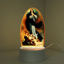 Immaculate Conception LED night light illuminated in a room