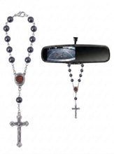 Jerusalem soil medal hematite bead car rosary hanging from rearview mirror