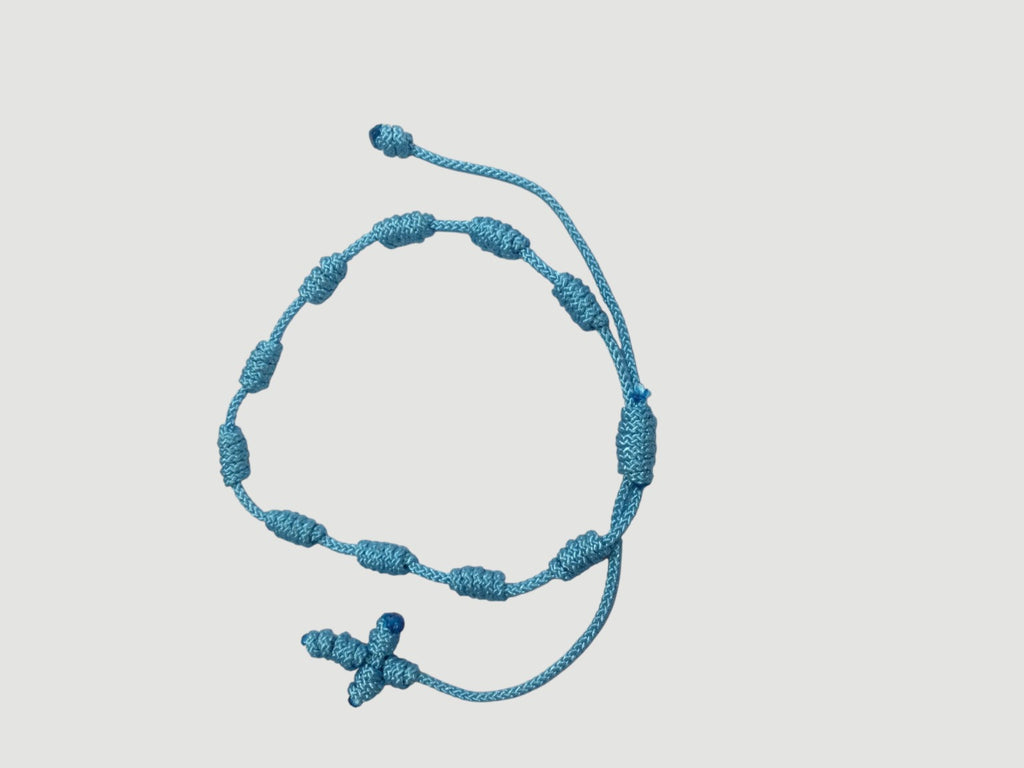 Light Blue adjustable knotted decade cord bracelet with woven cross