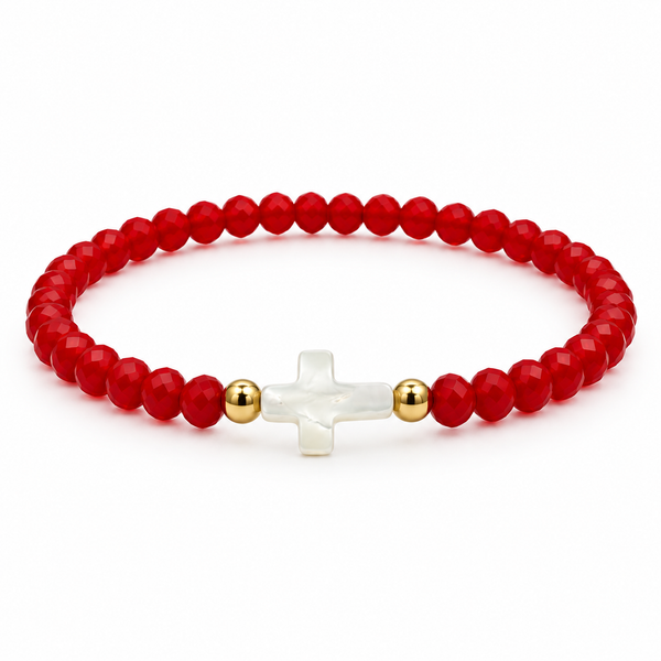red stretch bracelet with mother-of-pearl cross and two gold-tone spacers on white