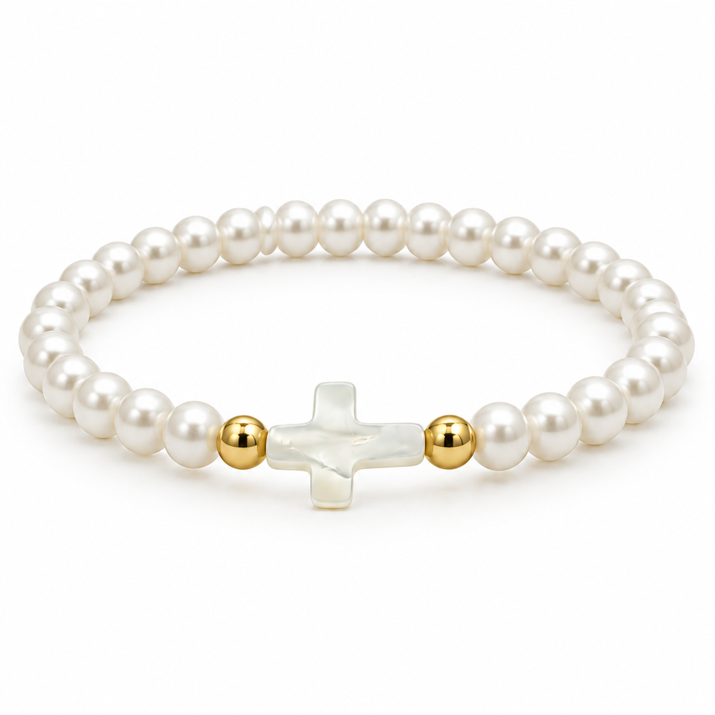 white pearl stretch bracelet with mother-of-pearl cross and two gold-tone spacers on white