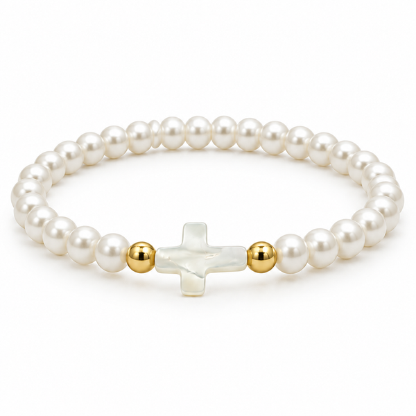 white pearl stretch bracelet with mother-of-pearl cross and two gold-tone spacers on white
