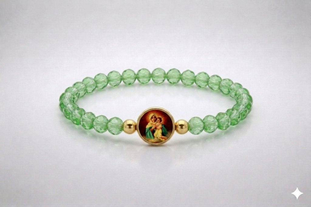 Our Lady of Schoenstatt light green crystal elastic bracelet with gold-tone accents, front view