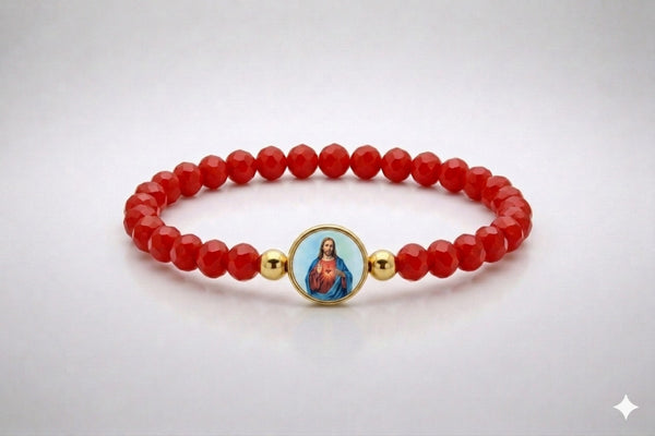 Sacred Heart of Jesus red crystal elastic bracelet with gold-tone centerpiece, front view