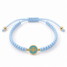 Saint Benedict light blue woven cord adjustable bracelet with gold-tone medal