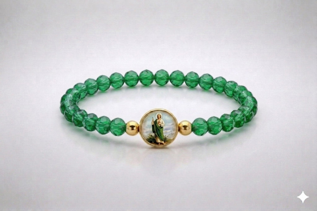 Saint Jude green crystal stretch bracelet with gold-tone accents, front view