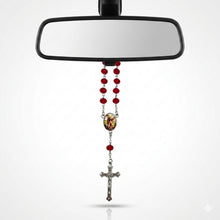 Saint Michael red crystal car rosary hanging from rearview mirror