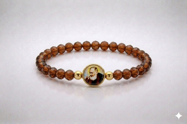 Saint Padre Pio brown crystal elastic bracelet with gold-tone accents, front view